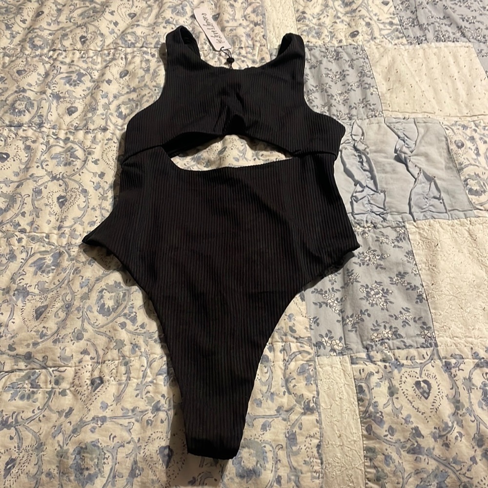 FL&L Bodysuit.  Size small.  Cutout to stomach.  Very sexy.